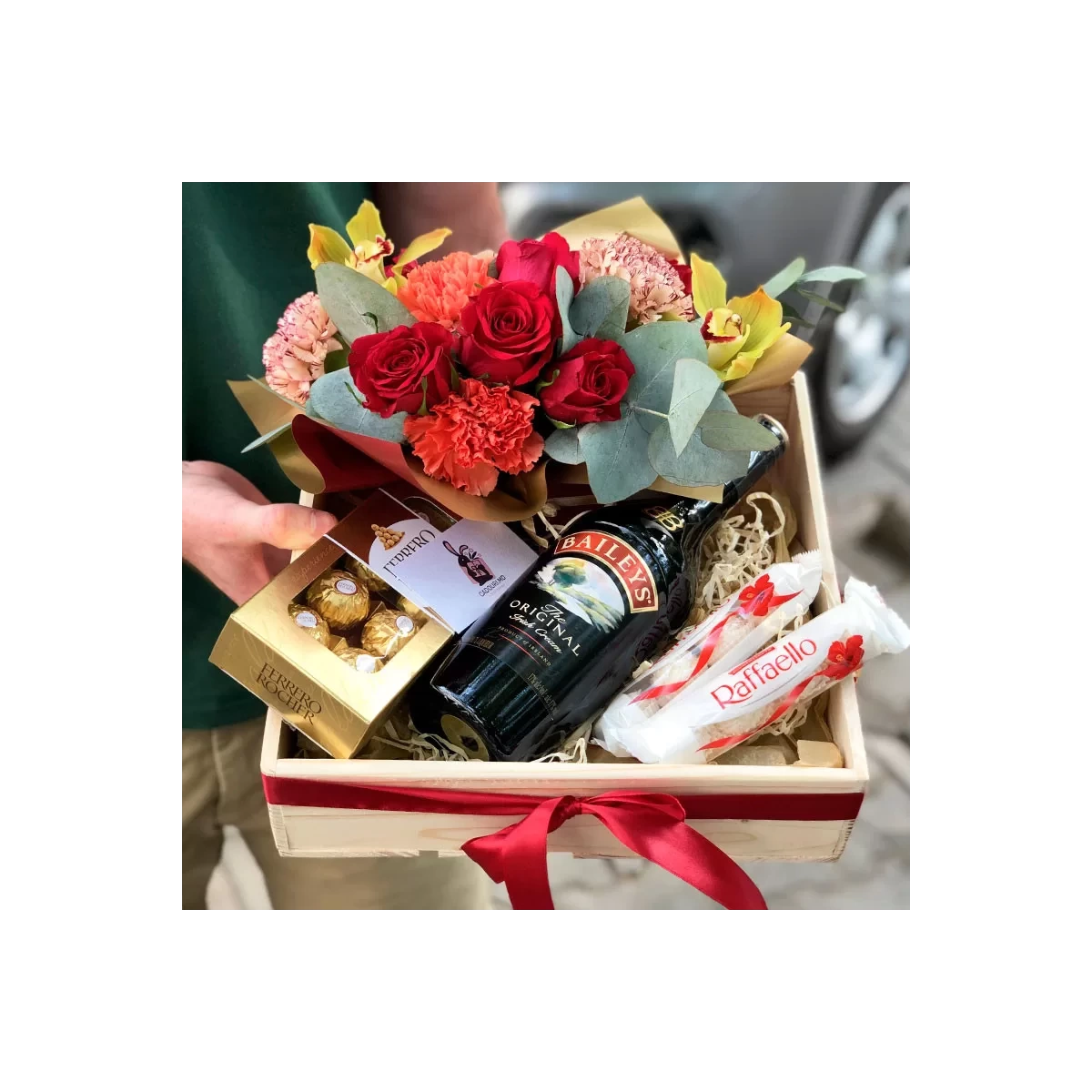 Gift set with flowers and rafaello photo