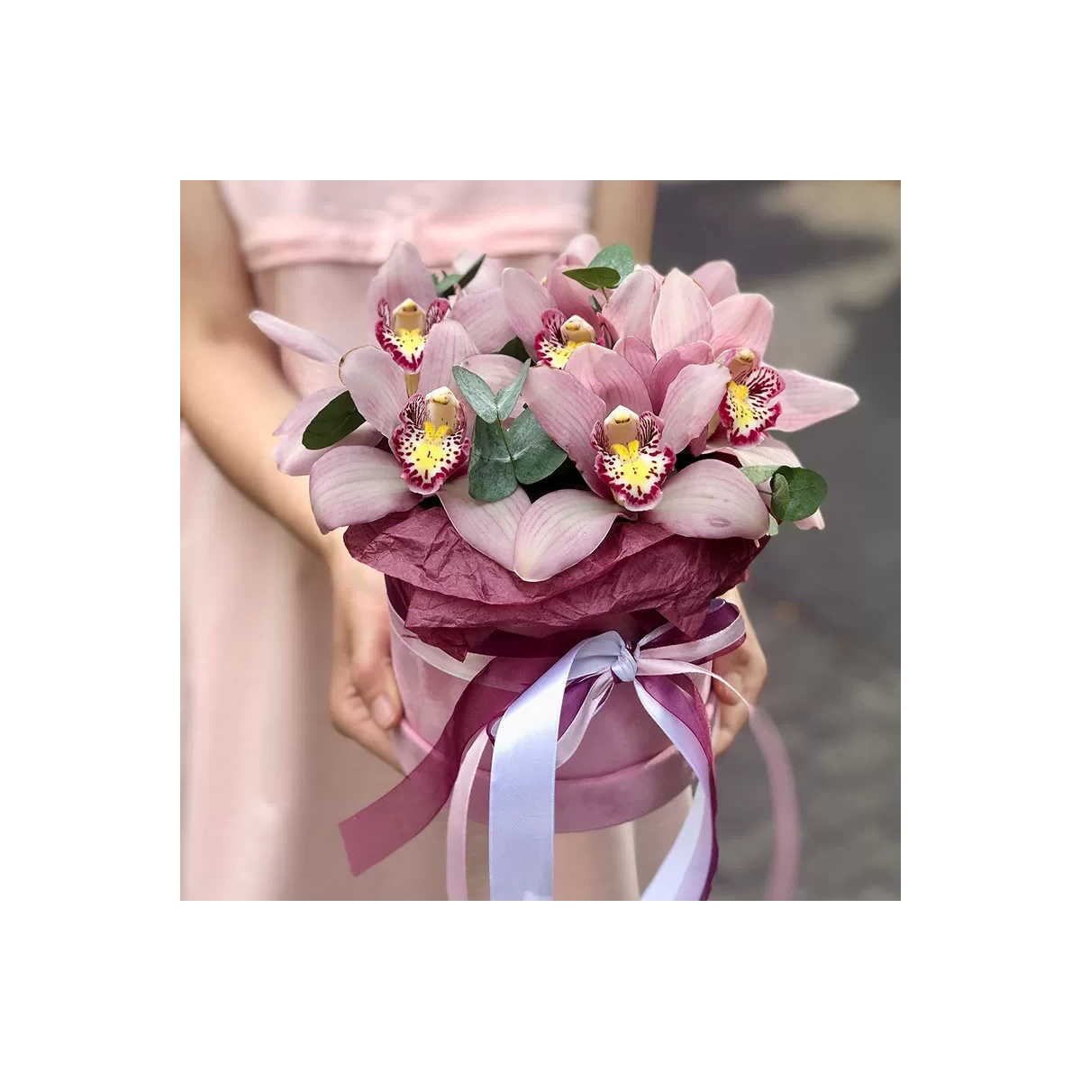 Box of pink orchids photo