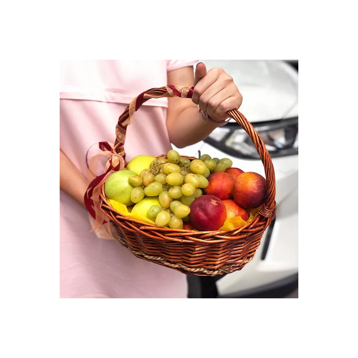 Fruit basket with peaches photo