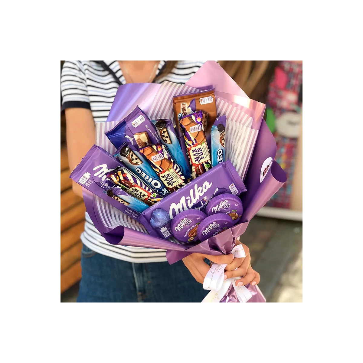 Bouquet with chocolate milka photo