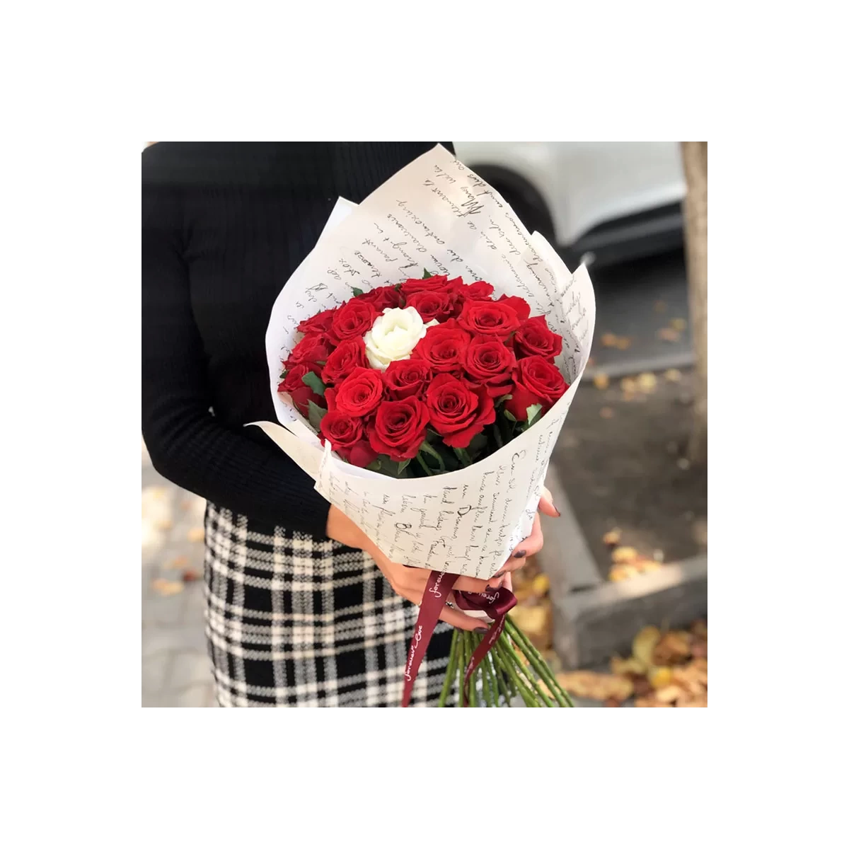 20 red roses and 1 white foto