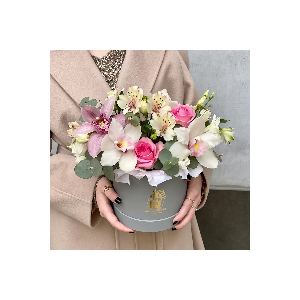 Bouquet in a gray box with orchids photo