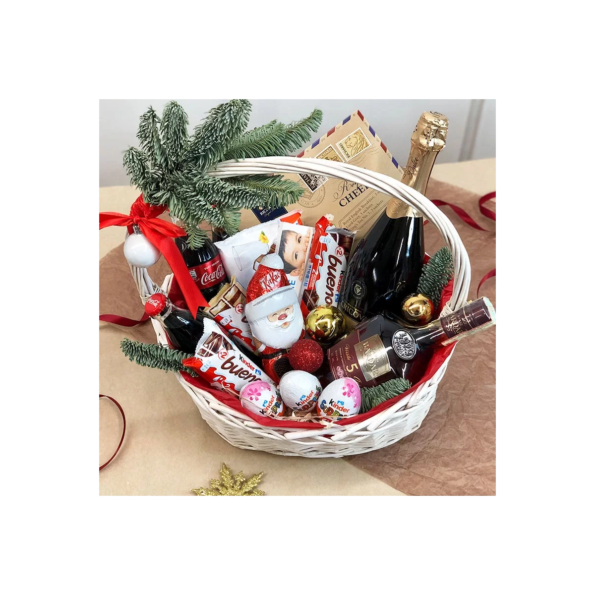 New Year's basket with chocolate and drinks for the whole family photo