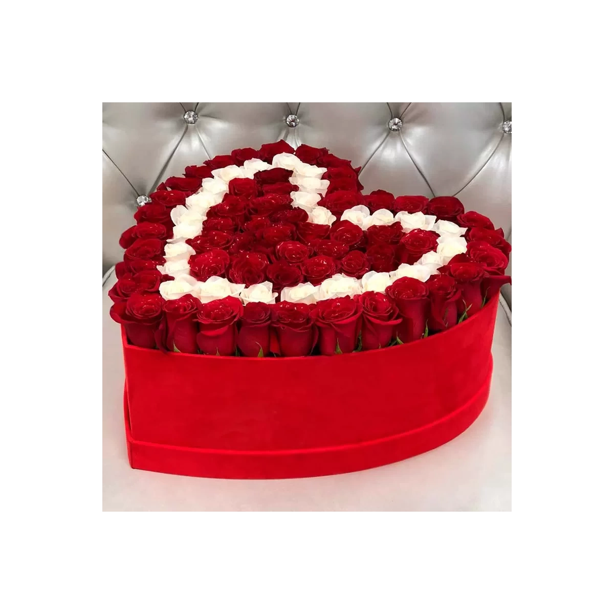 Large bouquet in a red heart-shaped box with red and white roses photo