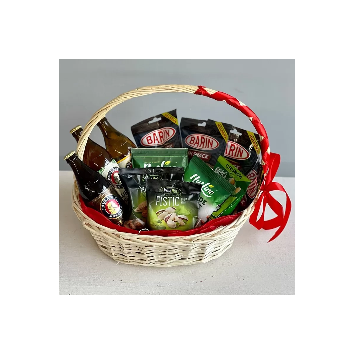 Basket with beer and dried fish photo