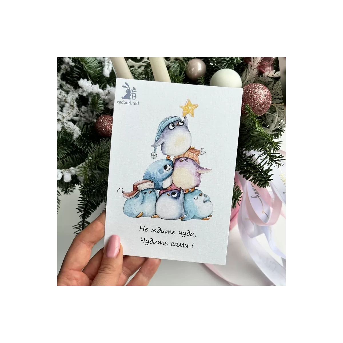 postcard christmas tree made of penguins photo