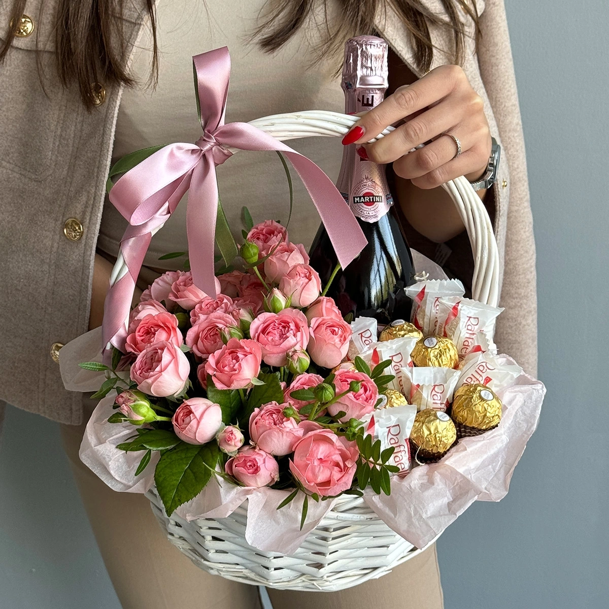 Delicate basket with roses and champagne photo