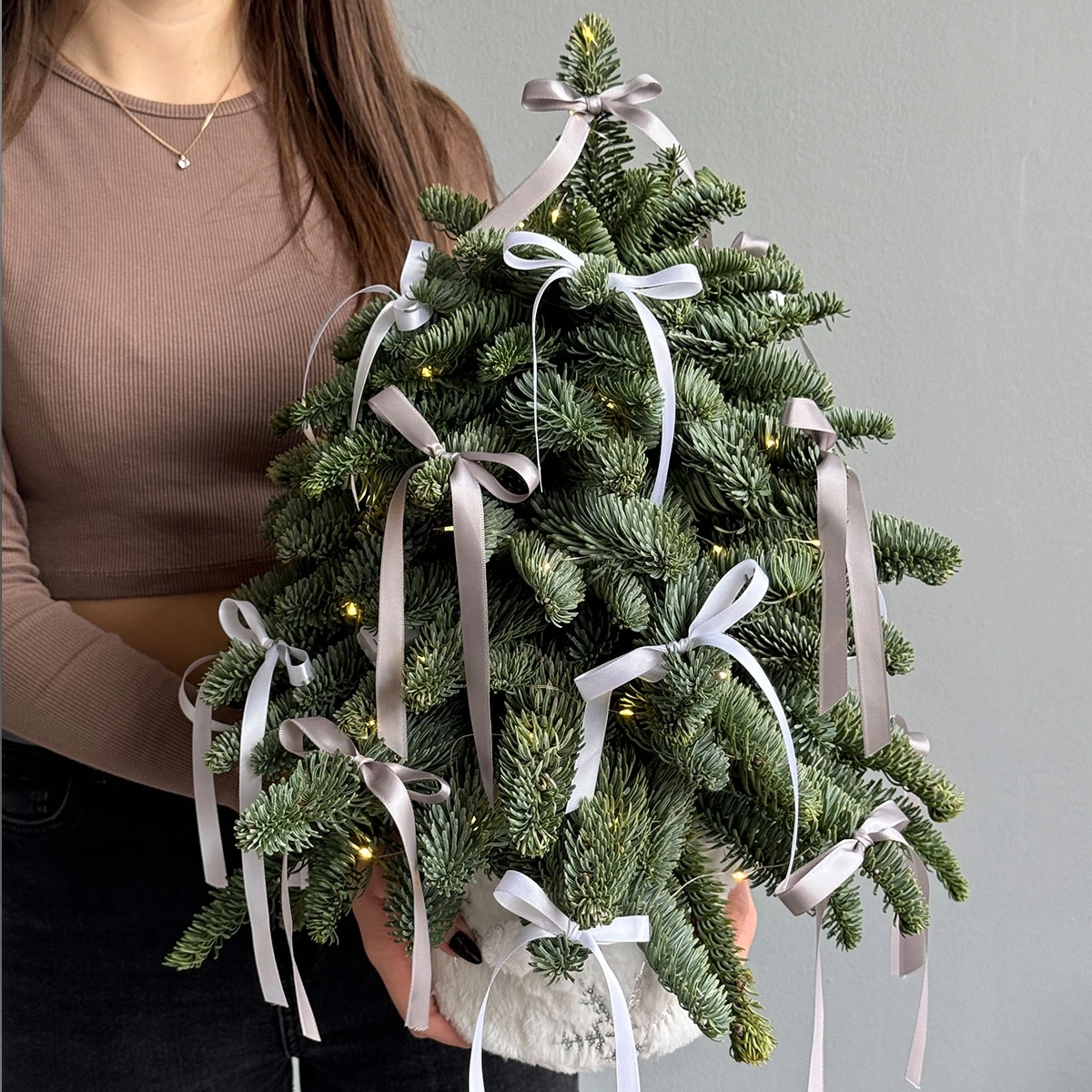 Christmas tree composition with bows photo