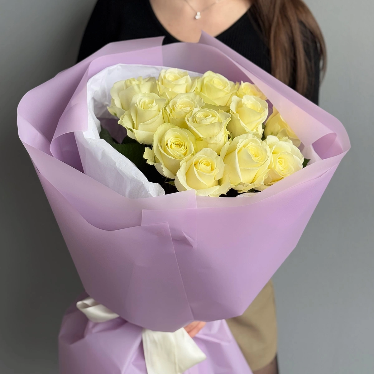 White Roses in Purple Packaging