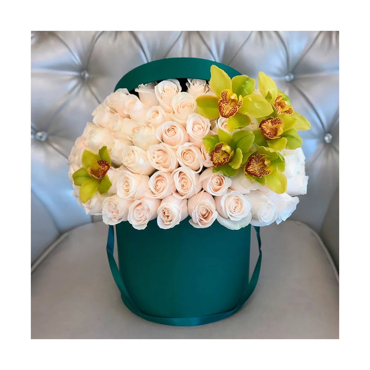 White roses with green orchid in box photo