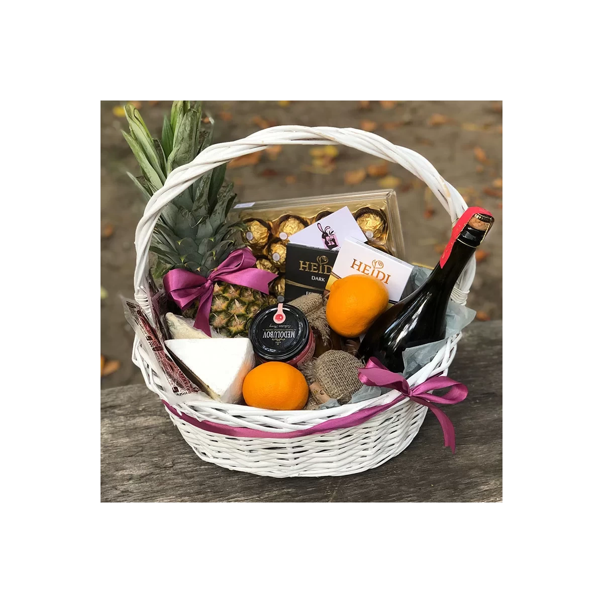 Basket with honey and fruits photo